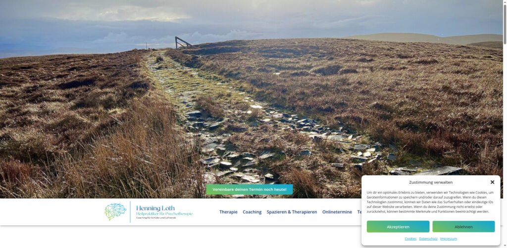 A rocky path winding through a grassy hilltop under a cloudy sky, suggesting a journey of healing and self-discovery.